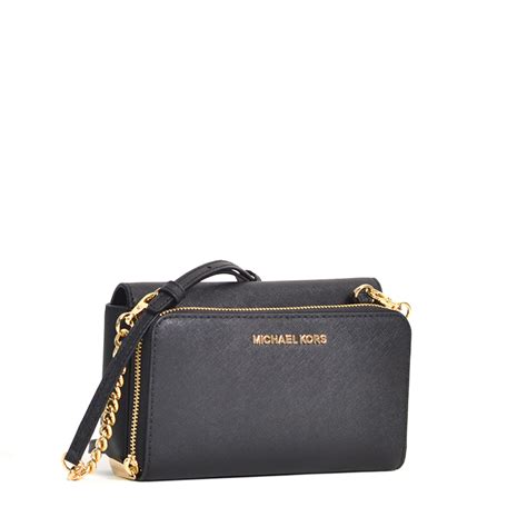 michael kors tina studded clutch black|Michael Kors Tina Small Clutch with Bow Crossbody Bag .